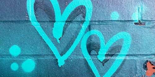 Blue love heart graffiti on wall