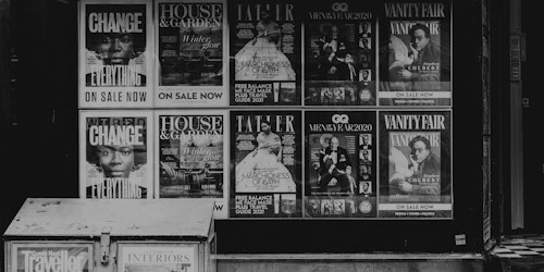 Black and white image of magazine stand