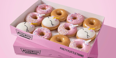 Box of 12 PrettyLittleThing and Krispy Kreme donuts 